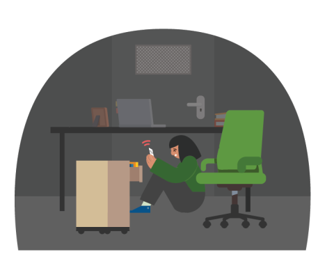 Illustration of a woman hiding under a desk, behind a barricaded door, on her phone texting.